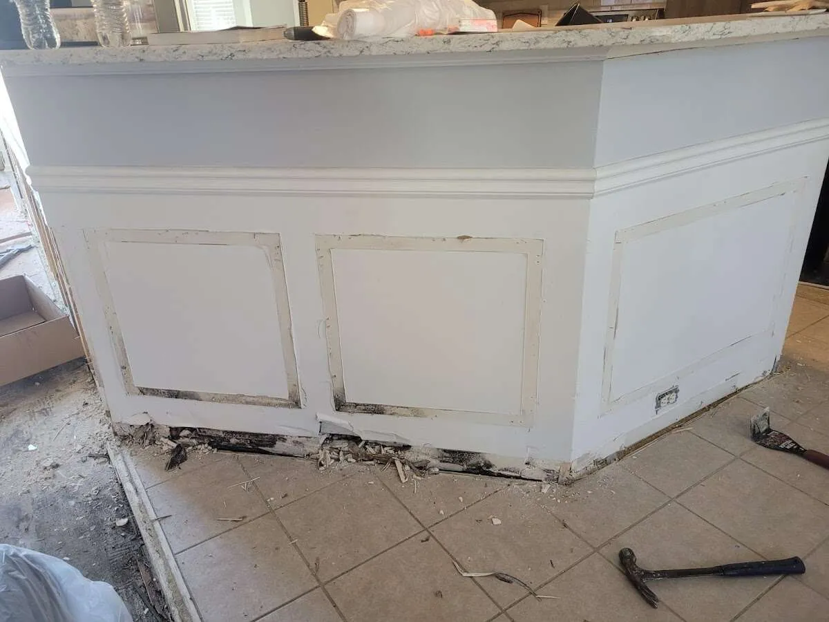 Water damage and mold on kitchen during Burst Pipe Cleanup in Duxbury